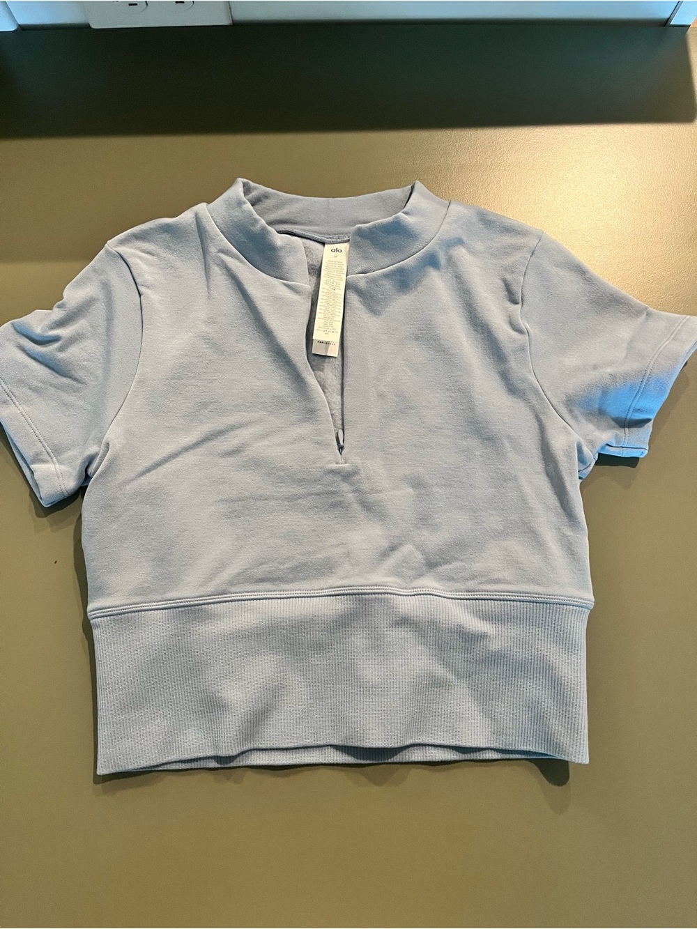 ALO Yoga Pale Blue Short Sleeve Cropped Top with Notch Neck